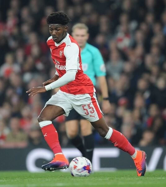 Arsenal's Ainsley Maitland-Niles in EFL Cup Action Against Reading