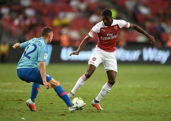 Arsenal's Ainsley Maitland-Niles Faces Off Against Atletico Madrid's Mikel Carro in International Champions Cup 2018