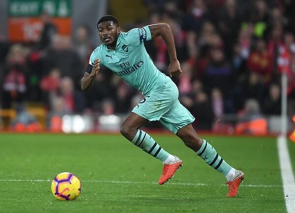 Arsenal's Ainsley Maitland-Niles Faces Off Against Liverpool at Anfield