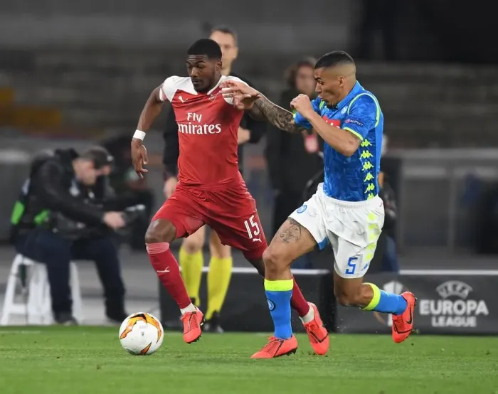 Framed Print : Arsenal's Ainsley Maitland-Niles Faces Off Against Napoli's Allan in Europa League Quarterfinal