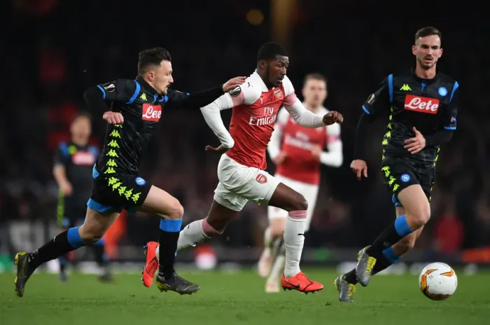Framed Print : Arsenal's Ainsley Maitland-Niles Faces Off Against Napoli's Mario Rui and Fabian Ruiz in Europa League Quarterfinal Showdown Framed Print : Arsenal's Ainsley Maitland-Niles Faces Off Against Napoli's Mario Rui and Fabian Ruiz in Europa League Quarterfinal Showdown