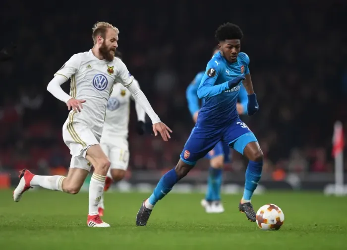 Framed Print : Arsenal's Ainsley Maitland-Niles Faces Off Against Östersunds Curtis Edwards in Europa League Clash