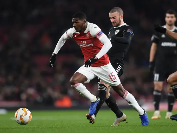Framed Print : Arsenal's Ainsley Maitland-Niles Faces Off Against Qarabag's Maksin Medvedev in Europa League Clash Framed Print : Arsenal's Ainsley Maitland-Niles Faces Off Against Qarabag's Maksin Medvedev in Europa League Clash