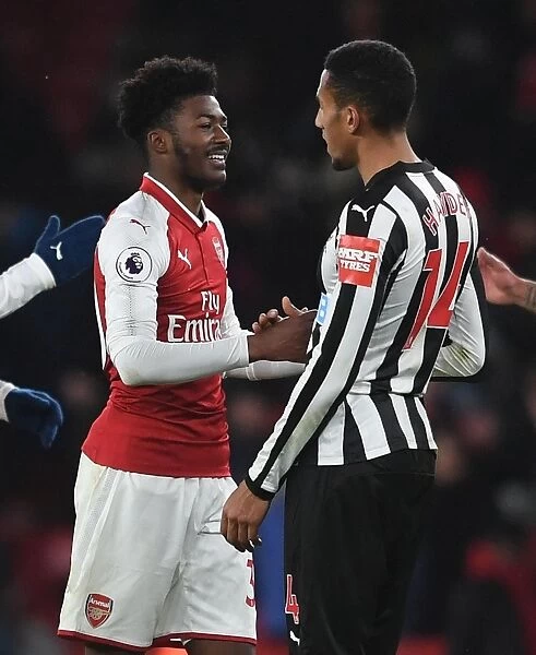 Arsenal's Ainsley Maitland-Niles and Newcastle's Isaac Hayden Share a Moment After intense Arsenal v Newcastle United Premier League Clash (2017-18)