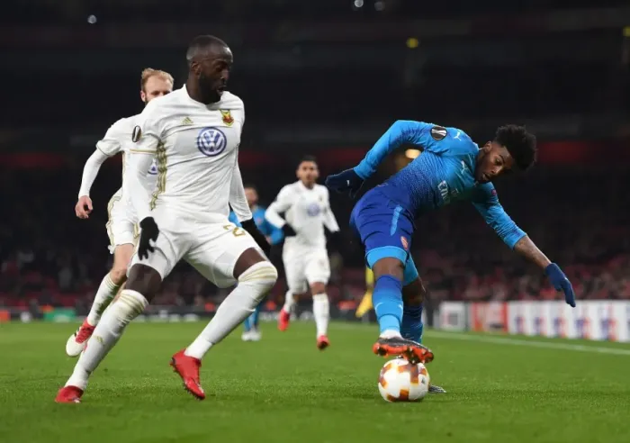 Framed Print : Arsenal's Ainsley Maitland-Niles vs. Östersunds Ken Sema: A Europa League Battle Framed Print : Arsenal's Ainsley Maitland-Niles vs. Östersunds Ken Sema: A Europa League Battle