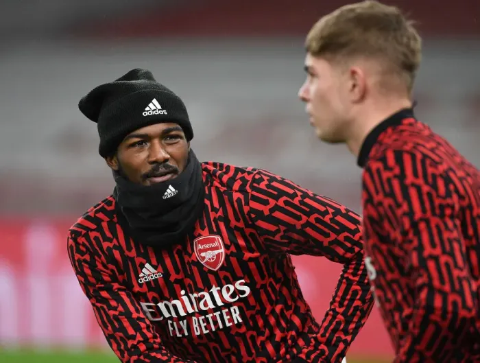 Framed Print : Arsenal's Ainsley Maitland-Niles Warms Up Ahead of Empty Emirates Stadium for Arsenal v Crystal Palace (2021) Framed Print : Arsenal's Ainsley Maitland-Niles Warms Up Ahead of Empty Emirates Stadium for Arsenal v Crystal Palace (2021)