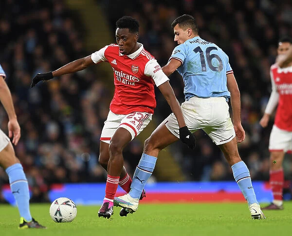 Arsenal's Albert Sambi Lokonga Battles Rodrigo in FA Cup Showdown: Manchester City vs. Arsenal (2022-23)