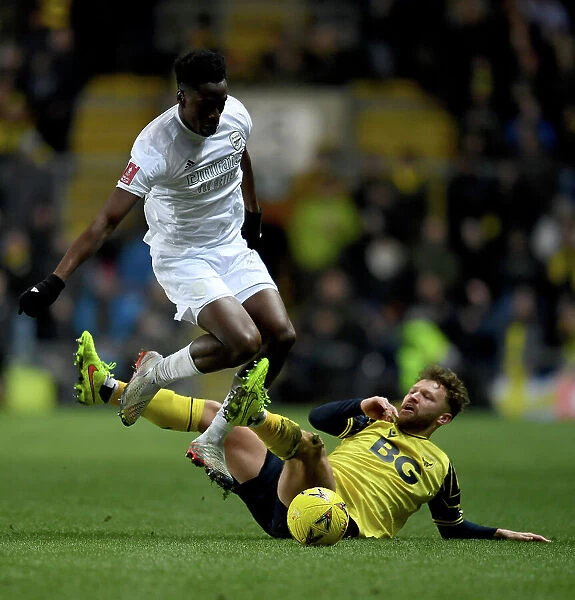 Arsenal's Albert Sambi Lokonga Faces Off Against Oxford's Matty Taylor in FA Cup Clash