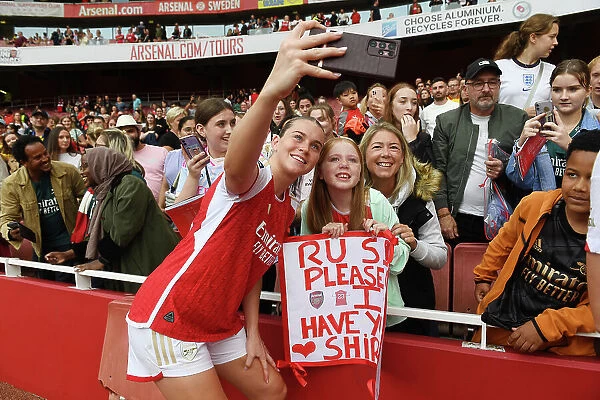 Arsenal's Alessia Russo and Young Fan Share a Selfie after Arsenal Women vs Liverpool Women Match at Emirates Stadium (2023-24)