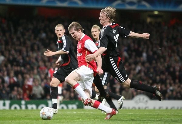Arsenal's Alex Hleb Fouled by Liverpool's Dirk Kuyt: Uncalled Penalty in Champions League Quarterfinal