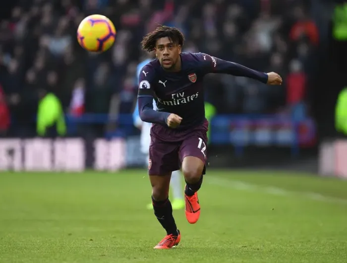 Framed Print : Arsenal's Alex Iwobi in Action Against Huddersfield Town in Premier League