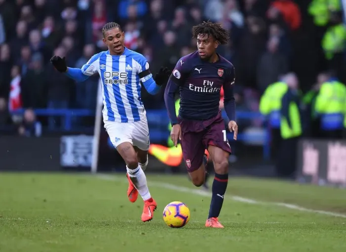 Framed Print : Arsenal's Alex Iwobi in Action Against Huddersfield Town in Premier League