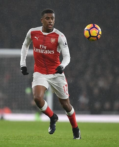 Arsenal's Alex Iwobi in Action during Premier League Clash Against Watford (2016-17)