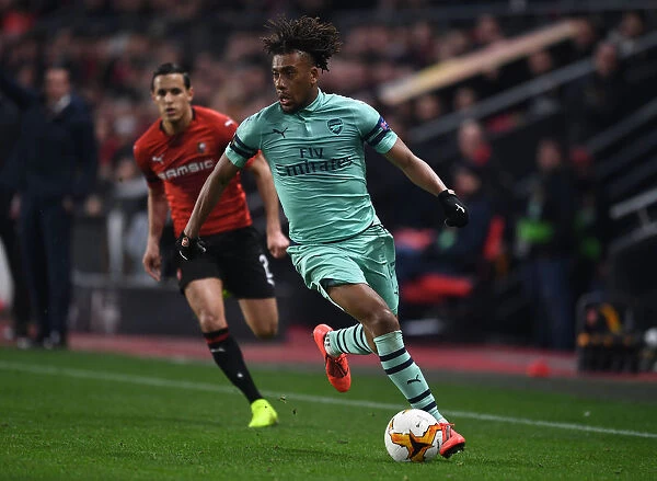 Arsenal's Alex Iwobi in Action against Stade Rennais in the 2018-19 Europa League Round of 16 First Leg