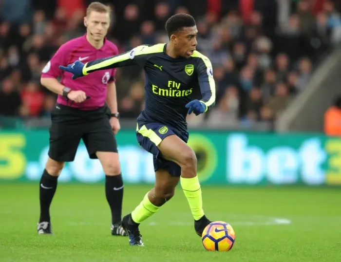 Framed Print : Arsenal's Alex Iwobi in Action against Swansea City (Premier League 2016-17) Framed Print : Arsenal's Alex Iwobi in Action against Swansea City (Premier League 2016-17)
