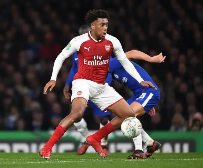 Framed Print : Arsenal's Alex Iwobi Clashes with Chelsea's Danny Drinkwater in Carabao Cup Semi-Final