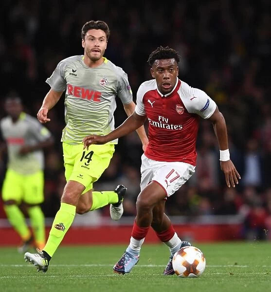 Arsenal's Alex Iwobi Clashes with Jonas Hector in Europa League Showdown