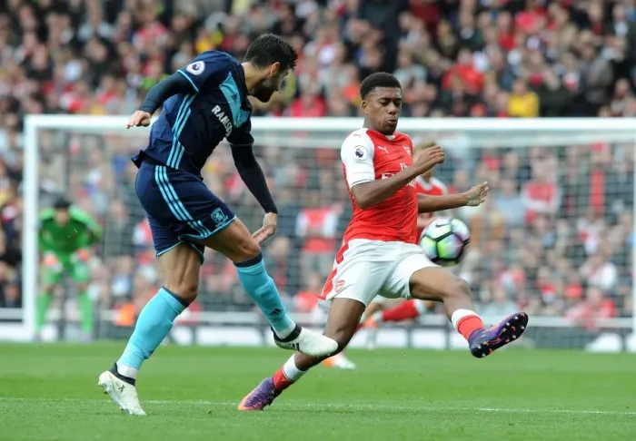 Framed Print : Arsenal's Alex Iwobi Closes Down Middlesbrough's Antonio Barragan in Premier League Showdown