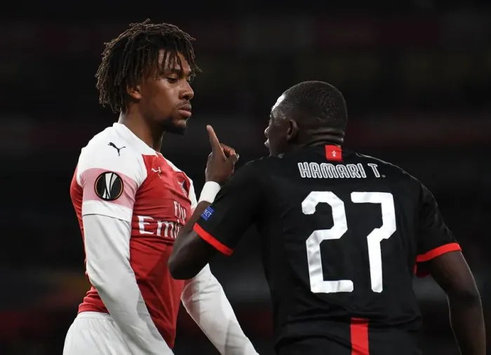 Framed Print : Arsenal's Alex Iwobi Faces Off Against Hamari Traore in Europa League Clash Framed Print : Arsenal's Alex Iwobi Faces Off Against Hamari Traore in Europa League Clash