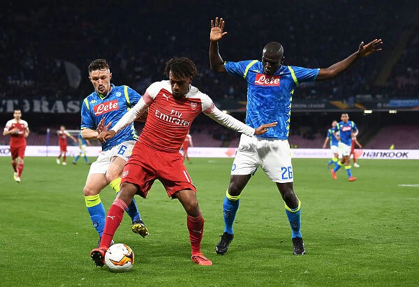 Arsenal's Alex Iwobi Faces Off Against Napoli's Kalidou Koulibaly and Mario Rui in Europa League Quarterfinal