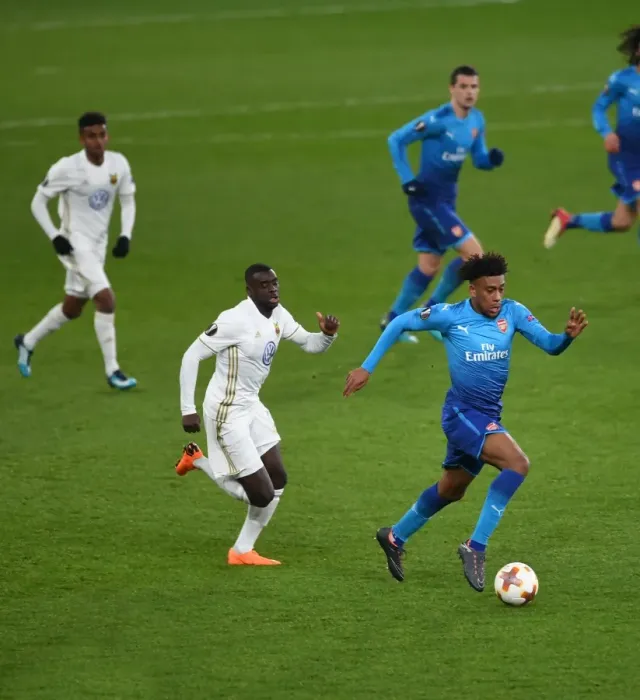 Framed Print : Arsenal's Alex Iwobi Faces Off Against Östersunds Ken Sema in Europa League Clash Framed Print : Arsenal's Alex Iwobi Faces Off Against Östersunds Ken Sema in Europa League Clash