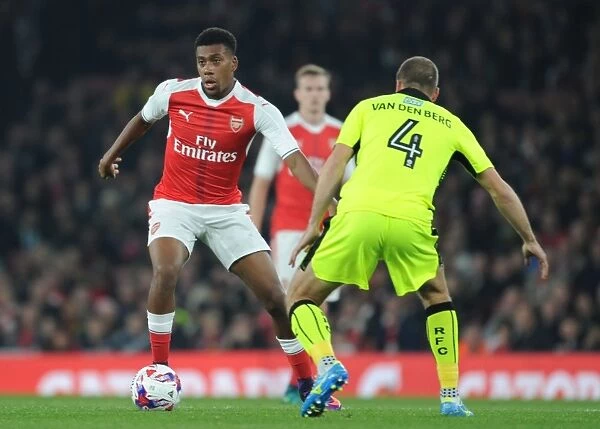 Arsenal's Alex Iwobi Faces Off Against Reading's Joey Van Den Berg in EFL Cup Clash
