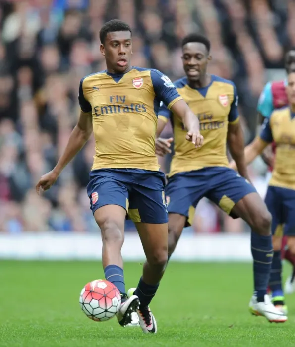 Framed Print : Arsenal's Alex Iwobi Faces Off Against West Ham United in Premier League Clash (2015-16) Framed Print : Arsenal's Alex Iwobi Faces Off Against West Ham United in Premier League Clash (2015-16)