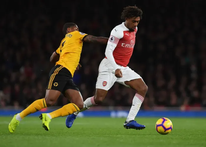 Framed Print : Arsenal's Alex Iwobi Outmaneuvers Wolverhampton's Ivan Cavaleiro Framed Print : Arsenal's Alex Iwobi Outmaneuvers Wolverhampton's Ivan Cavaleiro