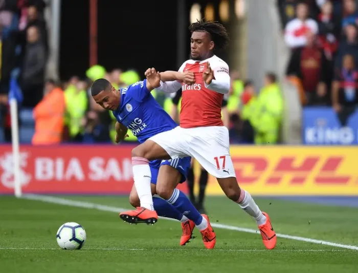 Framed Print : Arsenal's Alex Iwobi Outsmarts Tielemans: A Premier League Battle of Wits (Leicester vs Arsenal, 2018-19)