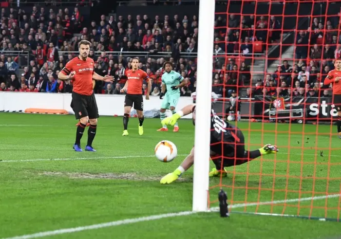 Framed Print : Arsenal's Alex Iwobi Scores Dramatic Goal Against Stade Rennais in Europa League First Leg