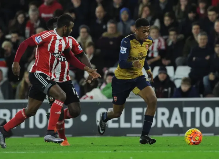 Framed Print : Arsenal's Alex Iwobi vs. Southampton's Cuco Martina: Intense Clash in Premier League Match (December 2015) Framed Print : Arsenal's Alex Iwobi vs. Southampton's Cuco Martina: Intense Clash in Premier League Match (December 2015)
