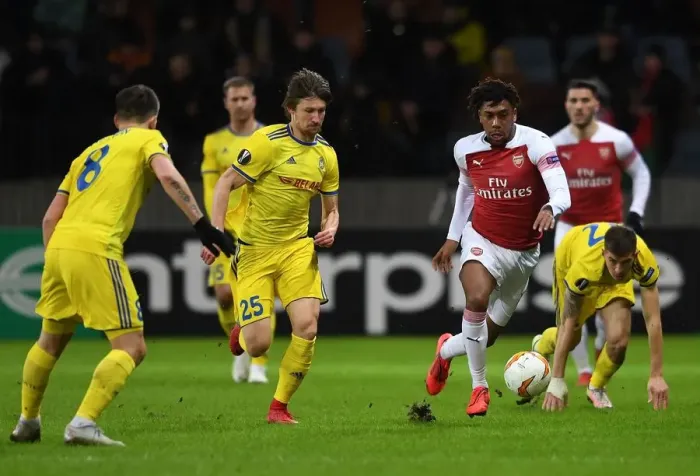 Framed Print : Arsenal's Alex Iwobi vs. Dmitri Baga: Europa League Clash Framed Print : Arsenal's Alex Iwobi vs. Dmitri Baga: Europa League Clash