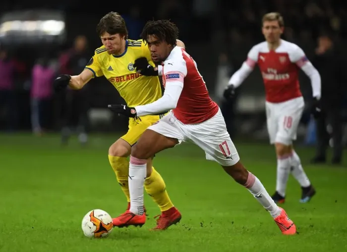 Framed Print : Arsenal's Alex Iwobi vs. Dmitri Baga: A Europa League Showdown at BATE Borisov Framed Print : Arsenal's Alex Iwobi vs. Dmitri Baga: A Europa League Showdown at BATE Borisov