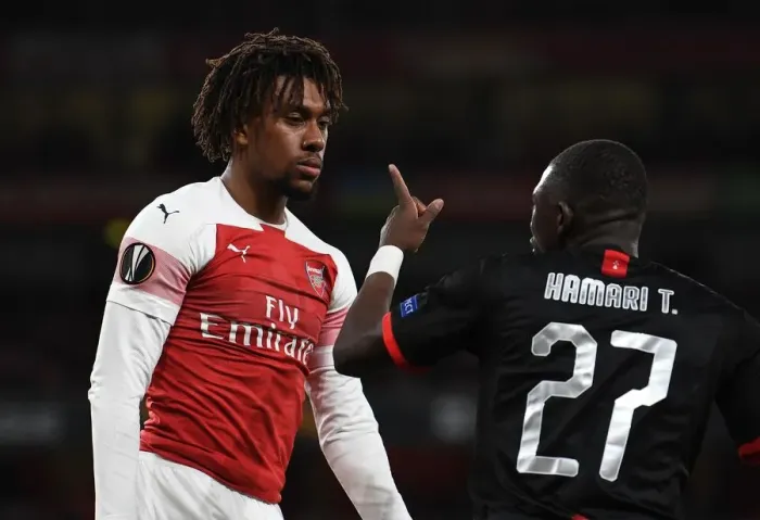 Framed Print : Arsenal's Alex Iwobi vs Hamari Traore: Europa League Clash Framed Print : Arsenal's Alex Iwobi vs Hamari Traore: Europa League Clash