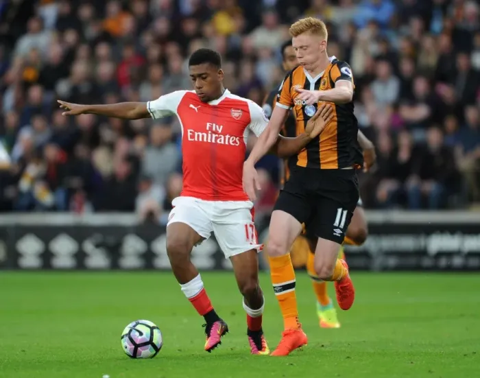 Framed Print : Arsenal's Alex Iwobi vs. Hull's Sam Clucas: A Premier League Battle Framed Print : Arsenal's Alex Iwobi vs. Hull's Sam Clucas: A Premier League Battle