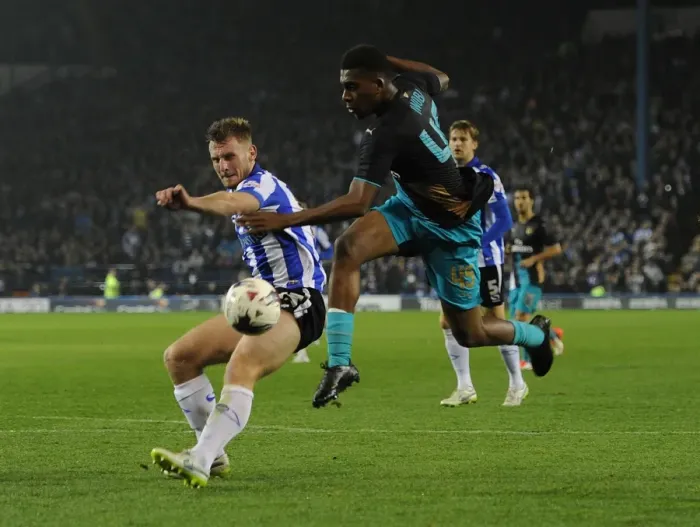 Framed Print : Arsenal's Alex Iwobi vs. Sheffield Wednesday's Tom Lees: A Capital One Cup Showdown Framed Print : Arsenal's Alex Iwobi vs. Sheffield Wednesday's Tom Lees: A Capital One Cup Showdown
