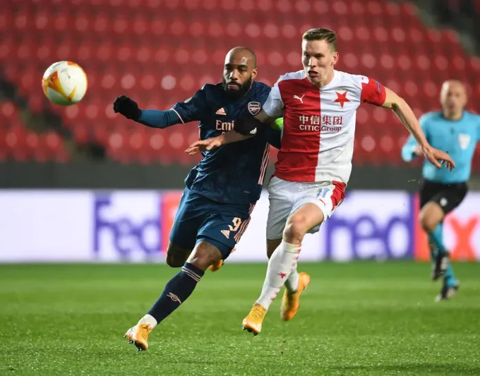 Framed Print : Arsenal's Alex Lacazette Breaks Past Slavia Praha's Lukas Provod in UEFA Europa League Quarterfinal Match in Prague