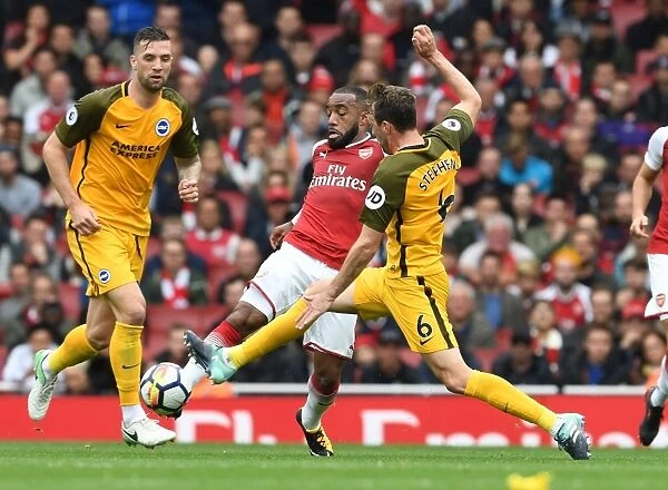 Arsenal's Alex Lacazette Clashes with Brighton's Dale Stephens in Premier League Showdown