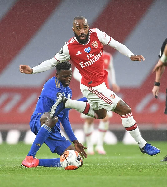Arsenal's Alex Lacazette Outmaneuvers Leicester's Wilfred Ndidi in Premier League Showdown