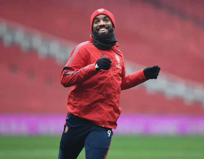 Framed Print : Arsenal's Alex Lacazette Prepares for Manchester United Clash in Premier League Showdown