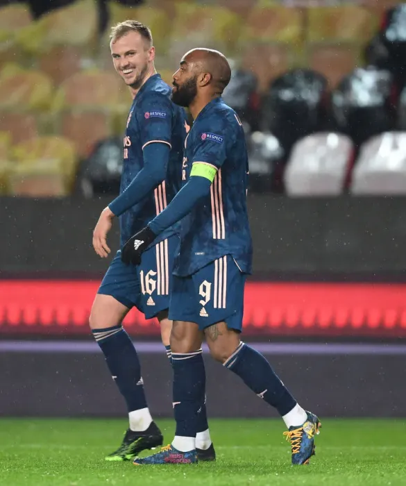 Framed Print : Arsenal's Alex Lacazette and Rob Holding Celebrate Goals in Empty Eden Arena: Slavia Prague vs Arsenal, UEFA Europa League Quarterfinal