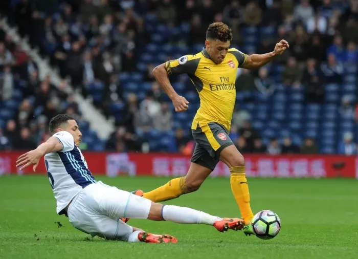 Framed Print : Arsenal's Alex Oxlade-Chamberlain Faces Off Against West Bromwich Albion's Jake Livermore
