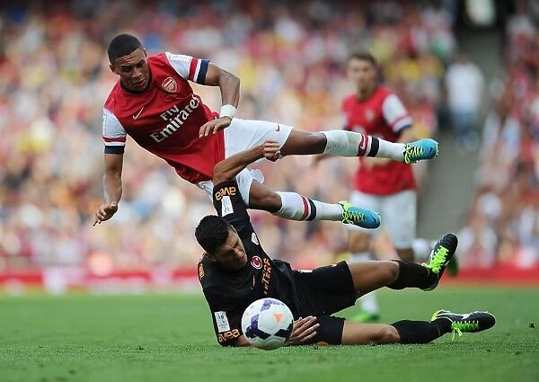 Arsenal's Alex Oxlade-Chamberlain Fouls by Galatasaray's Ceyhun Gulselam - Emirates Cup 2013