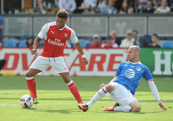 Arsenal's Alex Oxlade-Chamberlain Goes Head-to-Head with Laurent Ciman of MLS All-Stars