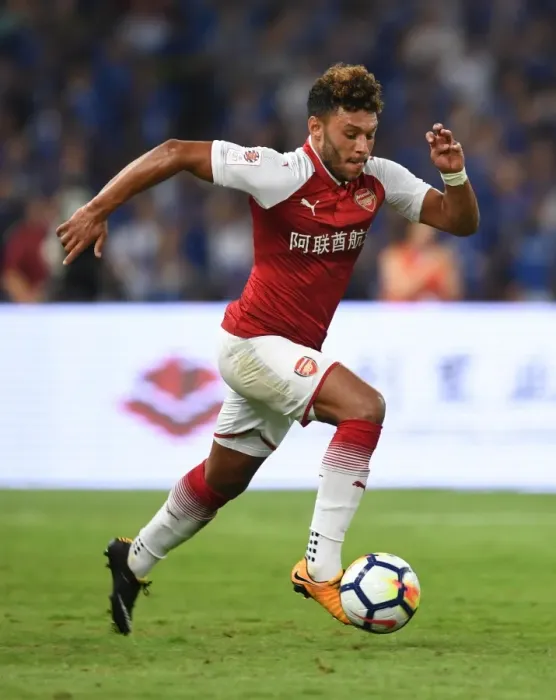 Framed Print : Arsenal's Alex Oxlade-Chamberlain Goes Head-to-Head Against Chelsea in Beijing Pre-Season Clash
