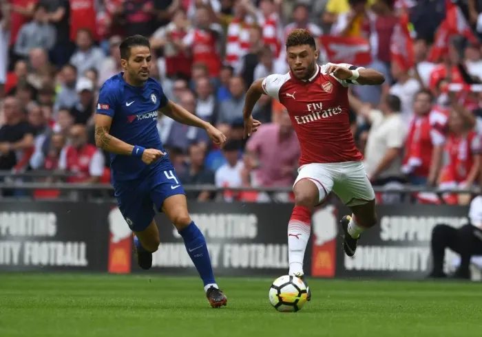 Framed Print : Arsenal's Alex Oxlade-Chamberlain Outmaneuvers Chelsea's Cesc Fabregas in FA Community Shield Clash