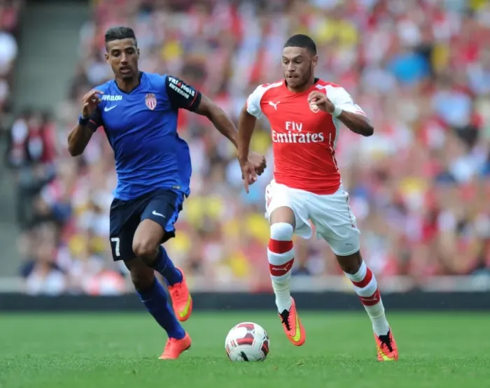 Framed Print : Arsenal's Alex Oxlade-Chamberlain Outmaneuvers AS Monaco's Nabil Dirar Framed Print : Arsenal's Alex Oxlade-Chamberlain Outmaneuvers AS Monaco's Nabil Dirar