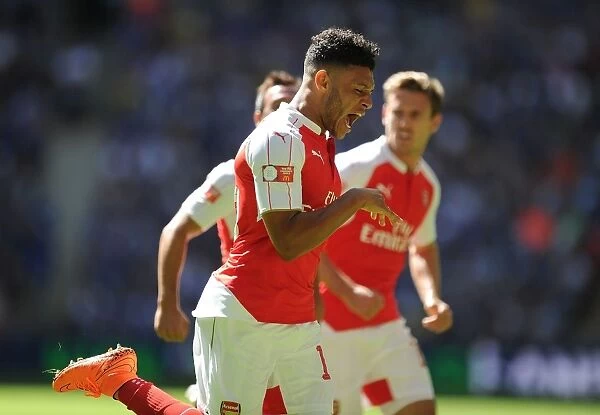 Arsenal's Alex Oxlade-Chamberlain Scores the Winning Goal: Arsenal Secures FA Community Shield against Chelsea (2015-16)