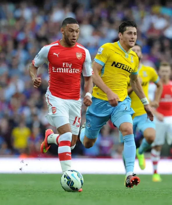 Framed Print : Arsenal's Alex Oxlade-Chamberlain vs. Crystal Palace's Joel Ward: A Football Showdown