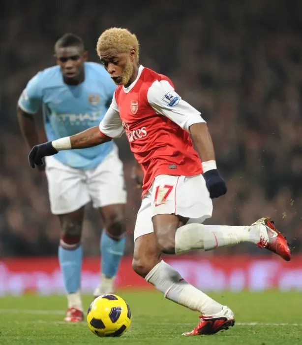 Framed Print : Arsenal's Alex Song Clashes with Manchester City in Intense Premier League Rivalry Framed Print : Arsenal's Alex Song Clashes with Manchester City in Intense Premier League Rivalry